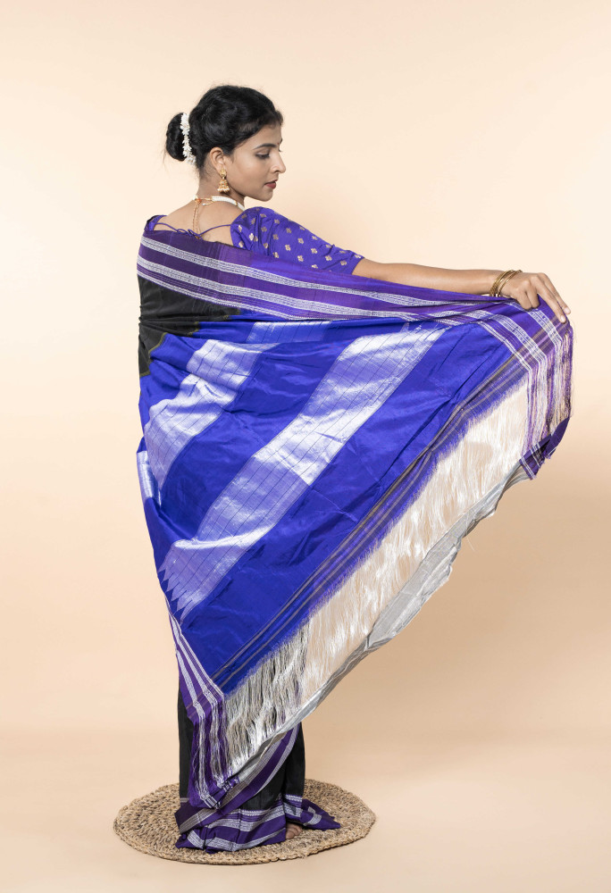 Lustrous Ocean Blue Silk Saree Adorned With Elegant White Accents